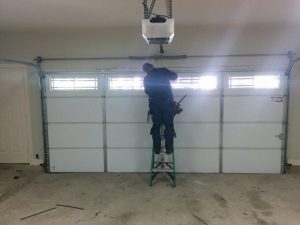 garage repair 1 300x225 Should You Try To Repair Your Garage Door Yourself?